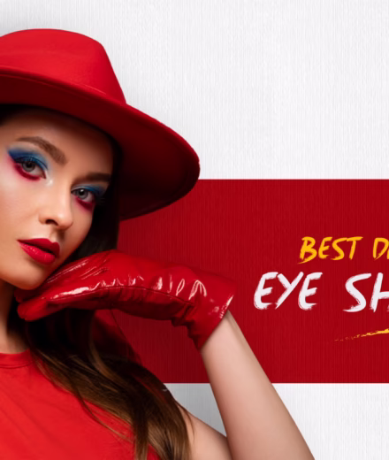 Model in red hat and gloves with bold eye makeup, 'Best Drugstore Eye Shadows'